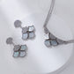 Jewelry set with necklace and earrings on a white background
