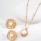 Gold necklace with pearl pendant on a white background